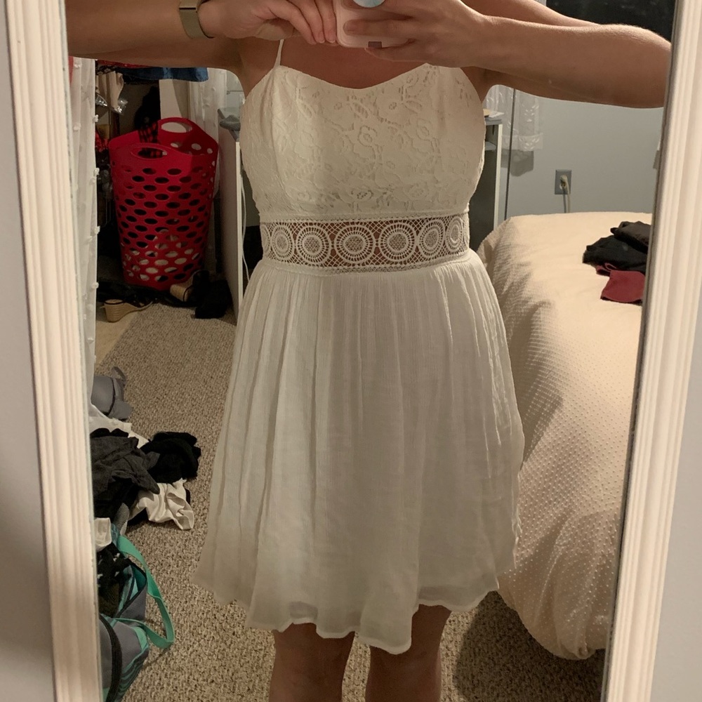 White lace cutout dress